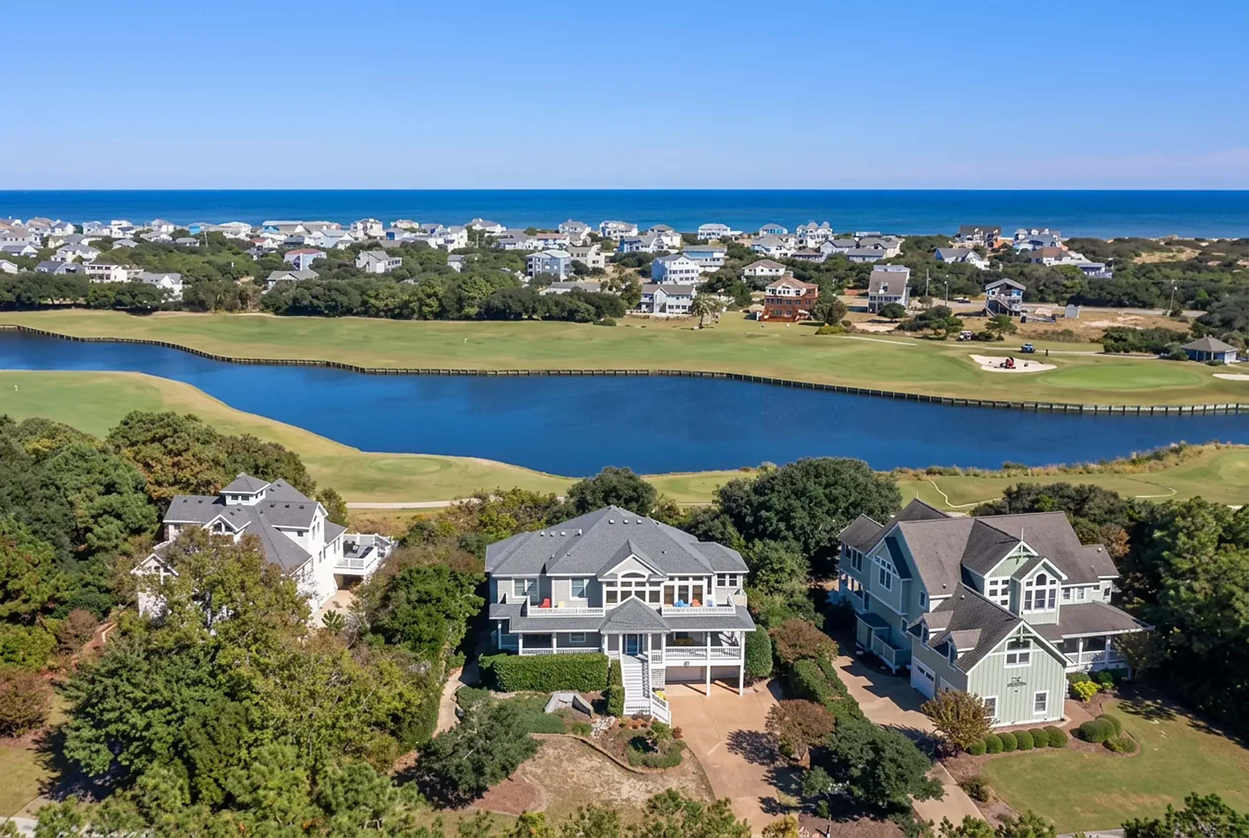 Aerial view of Outer Banks beach homes between a tidal sound and the Atlantic